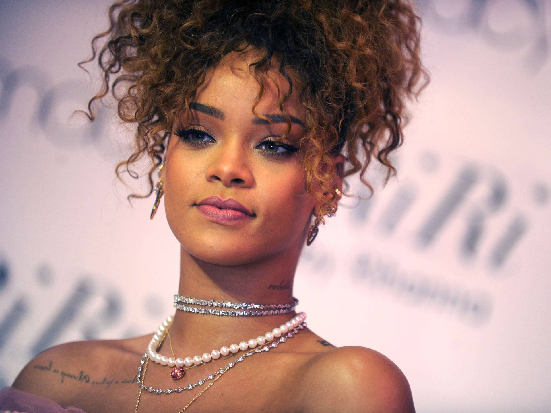 Rihanna At A Riri Event Background