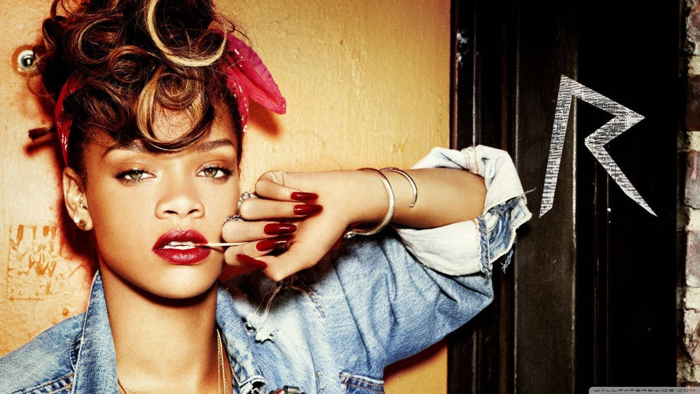 Rihanna Emanating The Denim Vibes Background