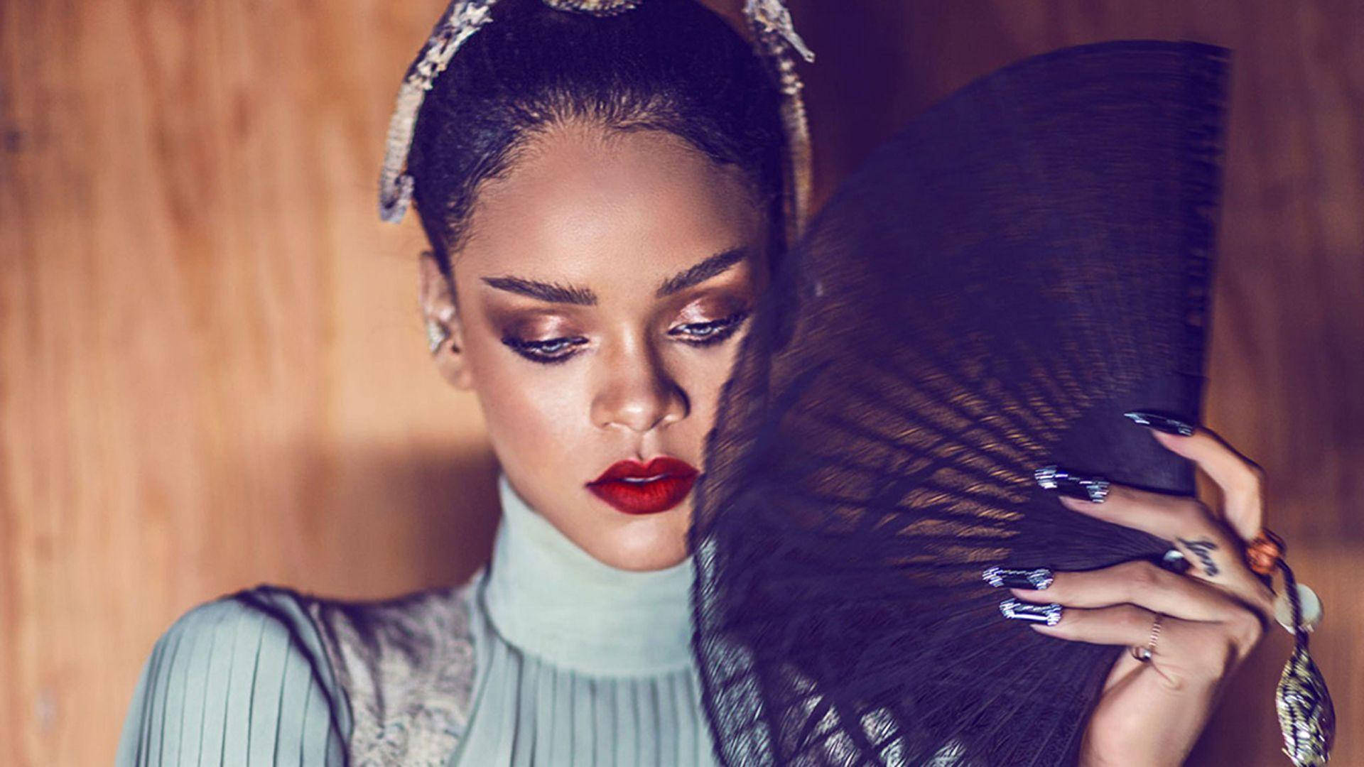 Rihanna Hd Holding Fan Background