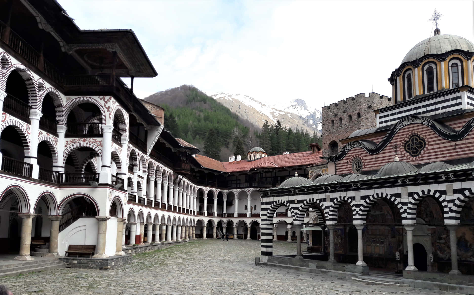 Rila Monastery Below The Clear Skies Background