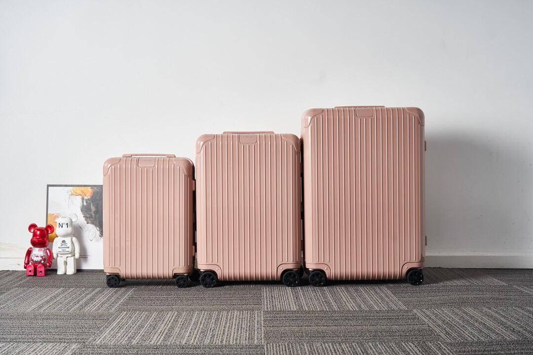 Rimowa Desert Rose Pink Suitcases Background