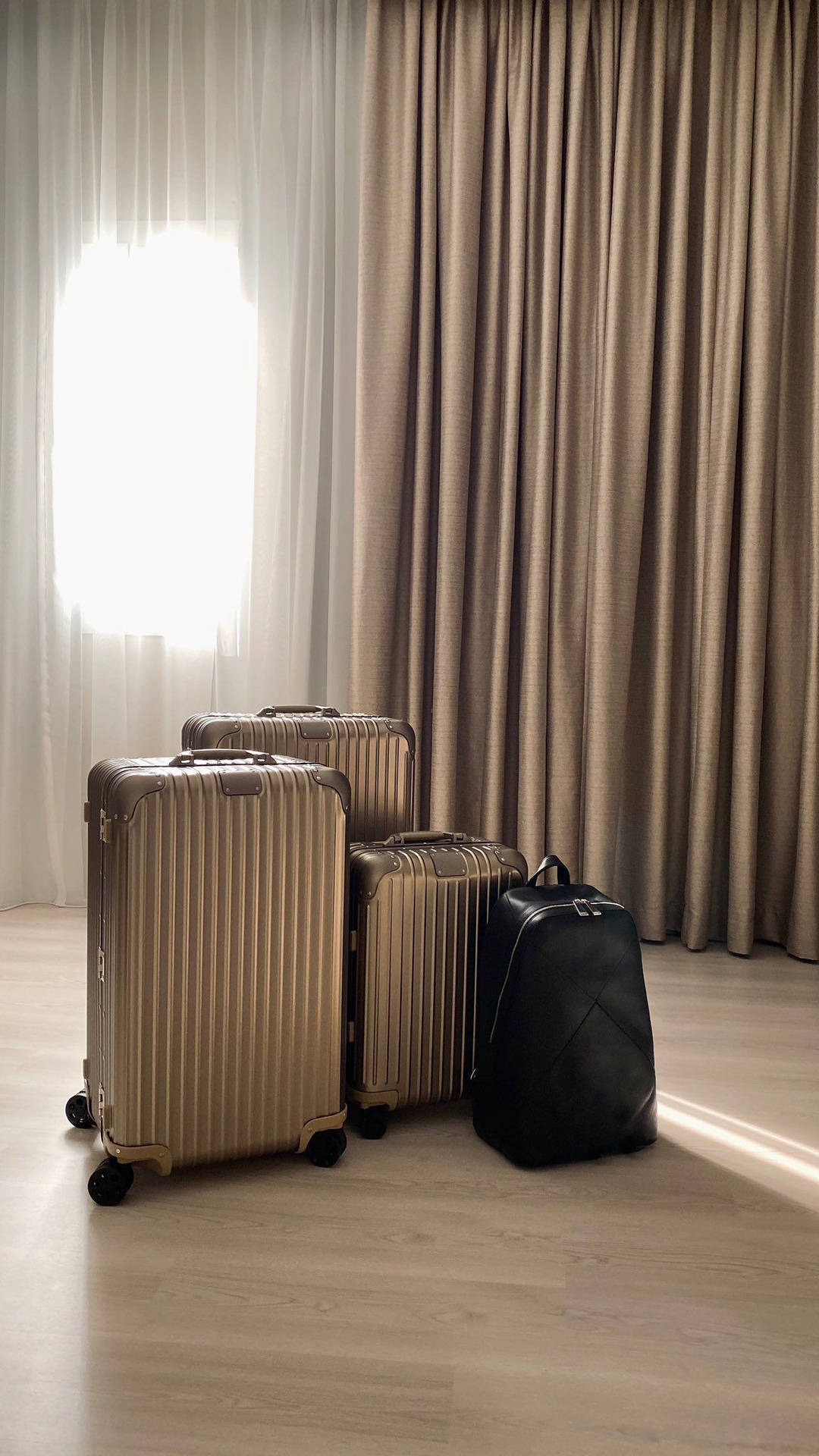 Rimowa Suitcases In Bright Room