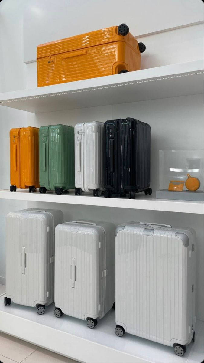 Rimowa Suitcases On Shelves