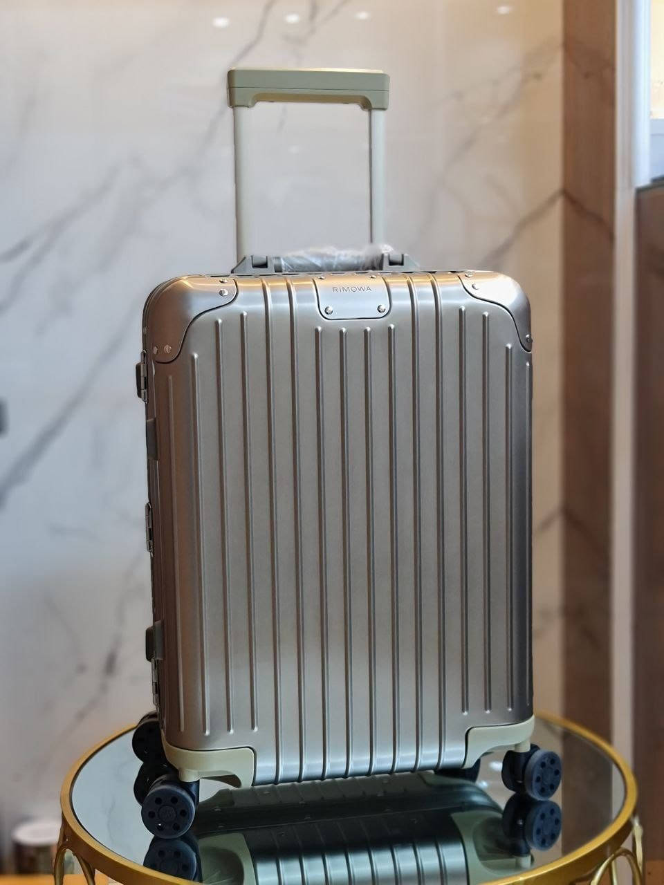 Rimowa Topaz Cabin Suitcase Background