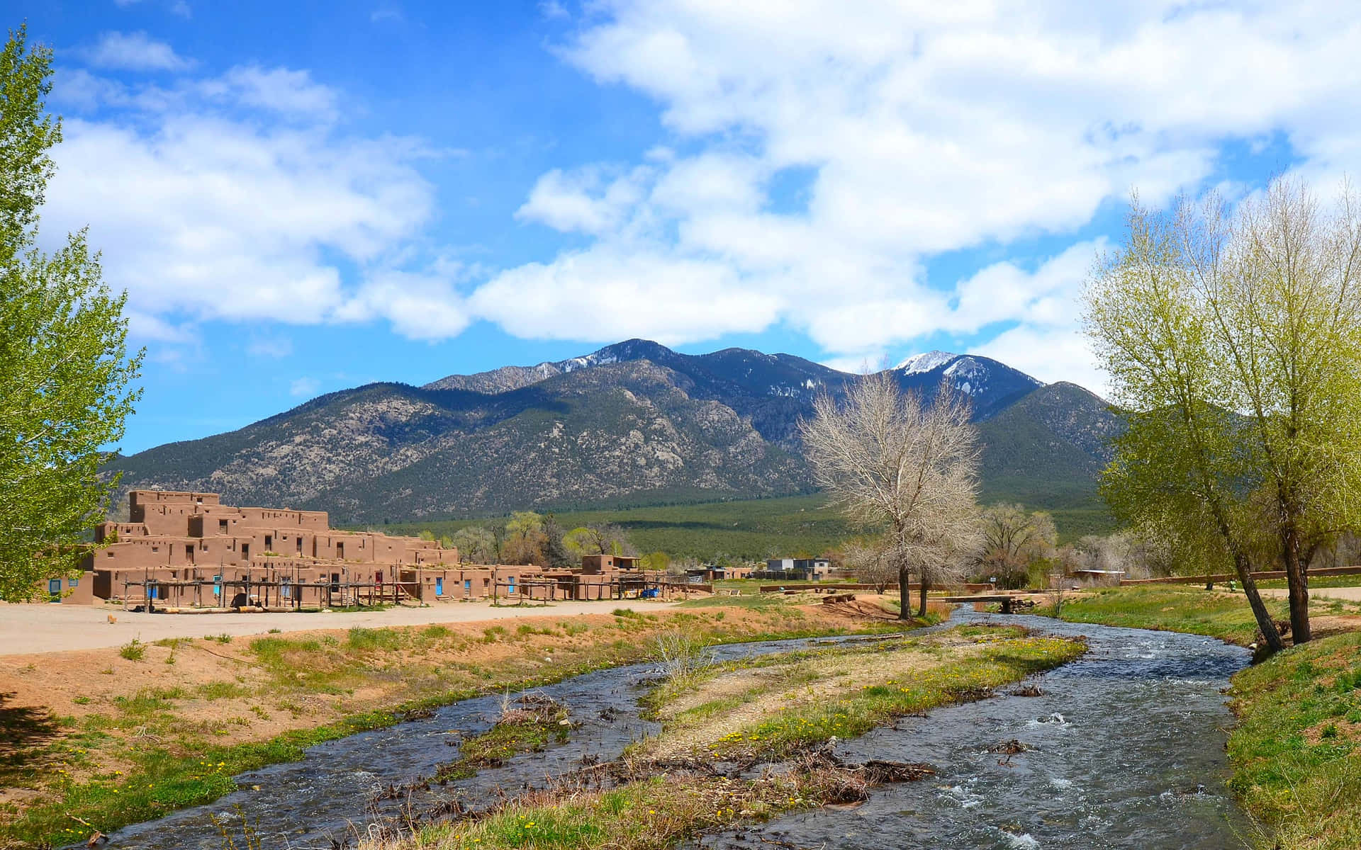 Rio Pueblo De Taos In Taos Pueblo Background