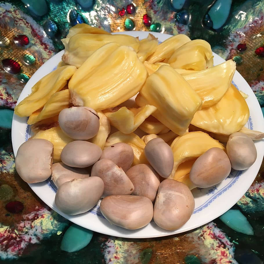 Ripe Jackfruit Flesh And Seeds Background