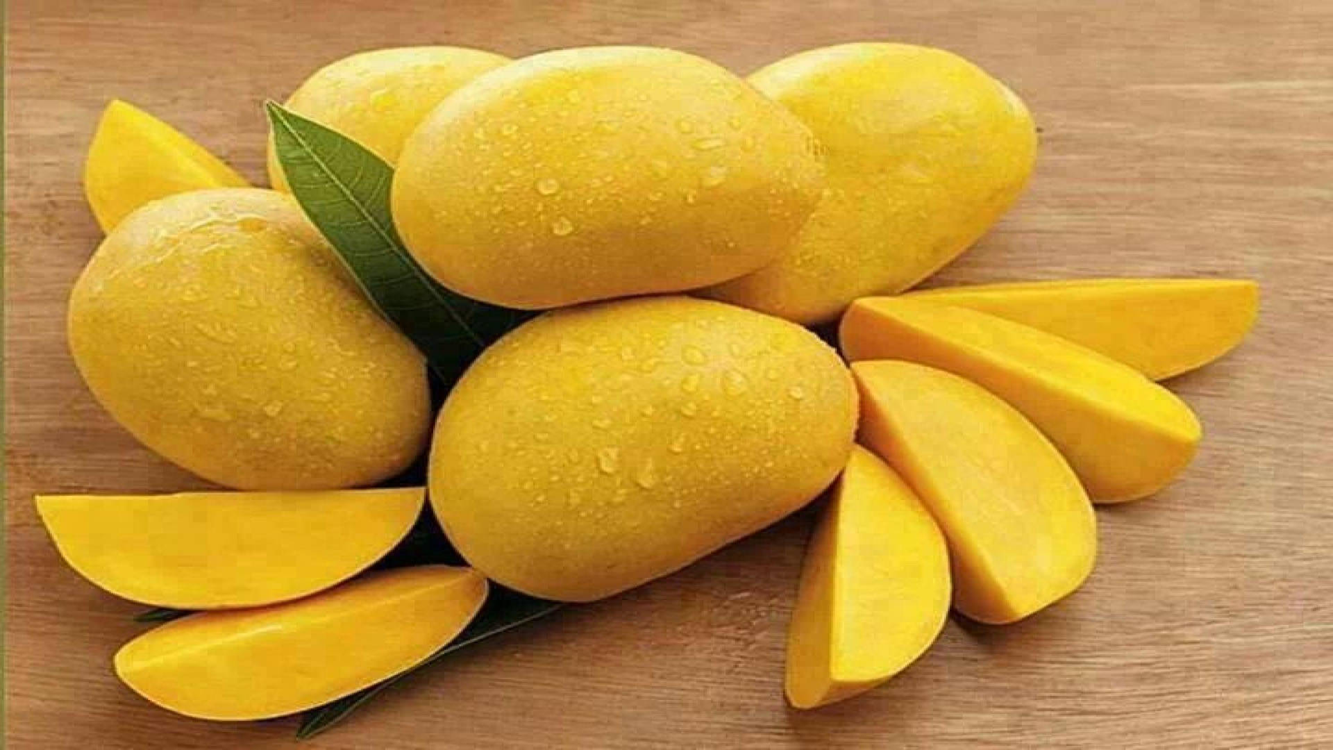 Ripe Yellow Mango Slices Background