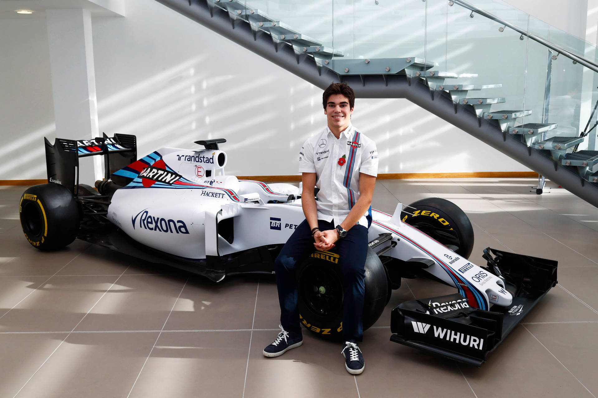 Rising Star Of Formula 1, Lance Stroll In Action Background