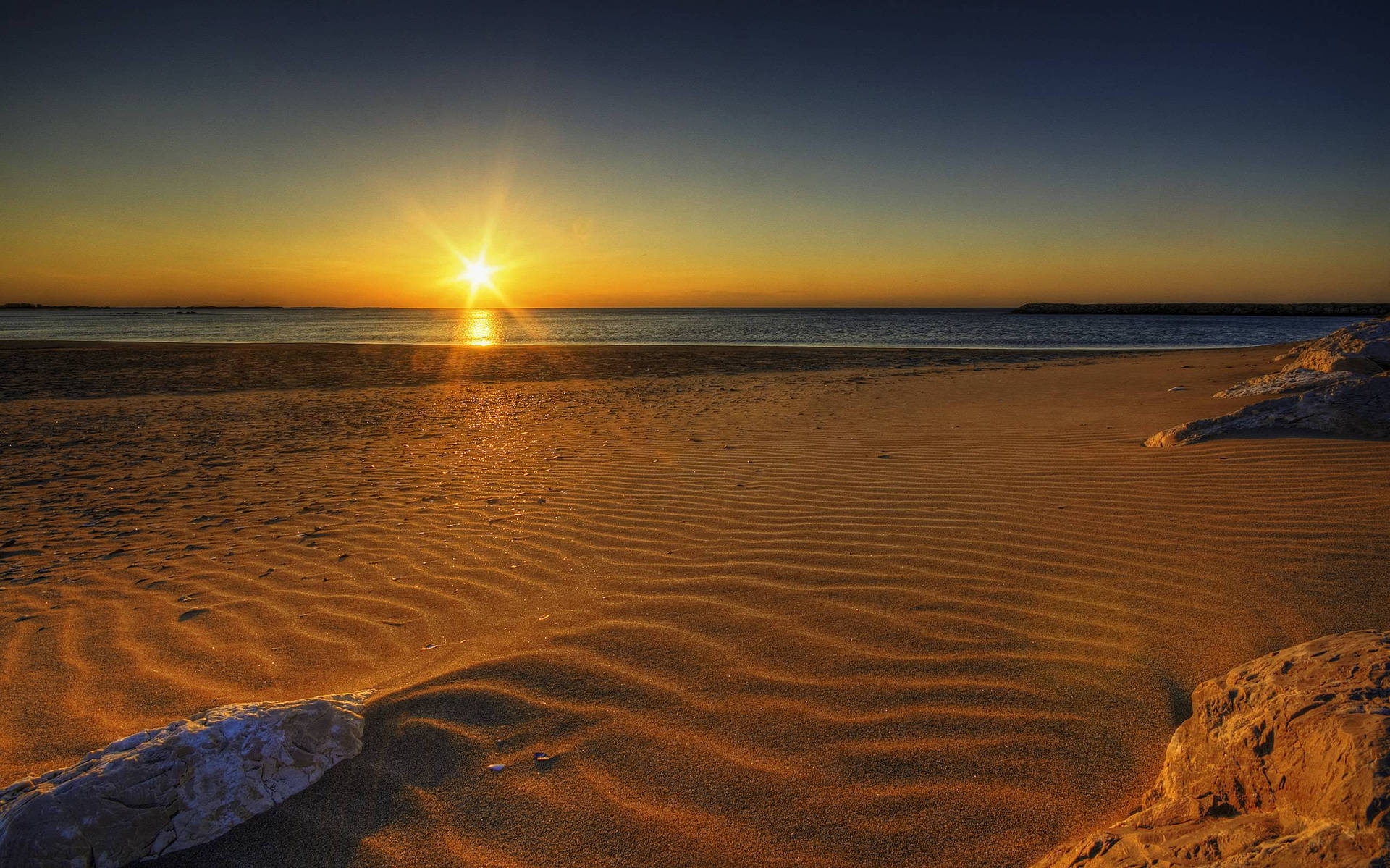 Rising Sun On Sandy Beach Background
