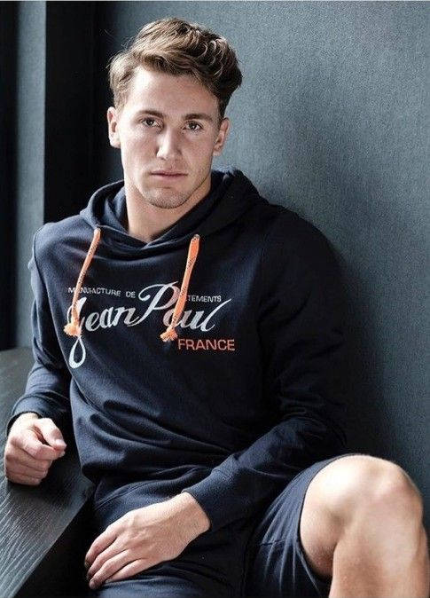 Rising Tennis Star Casper Ruud In Black Hoodie Background