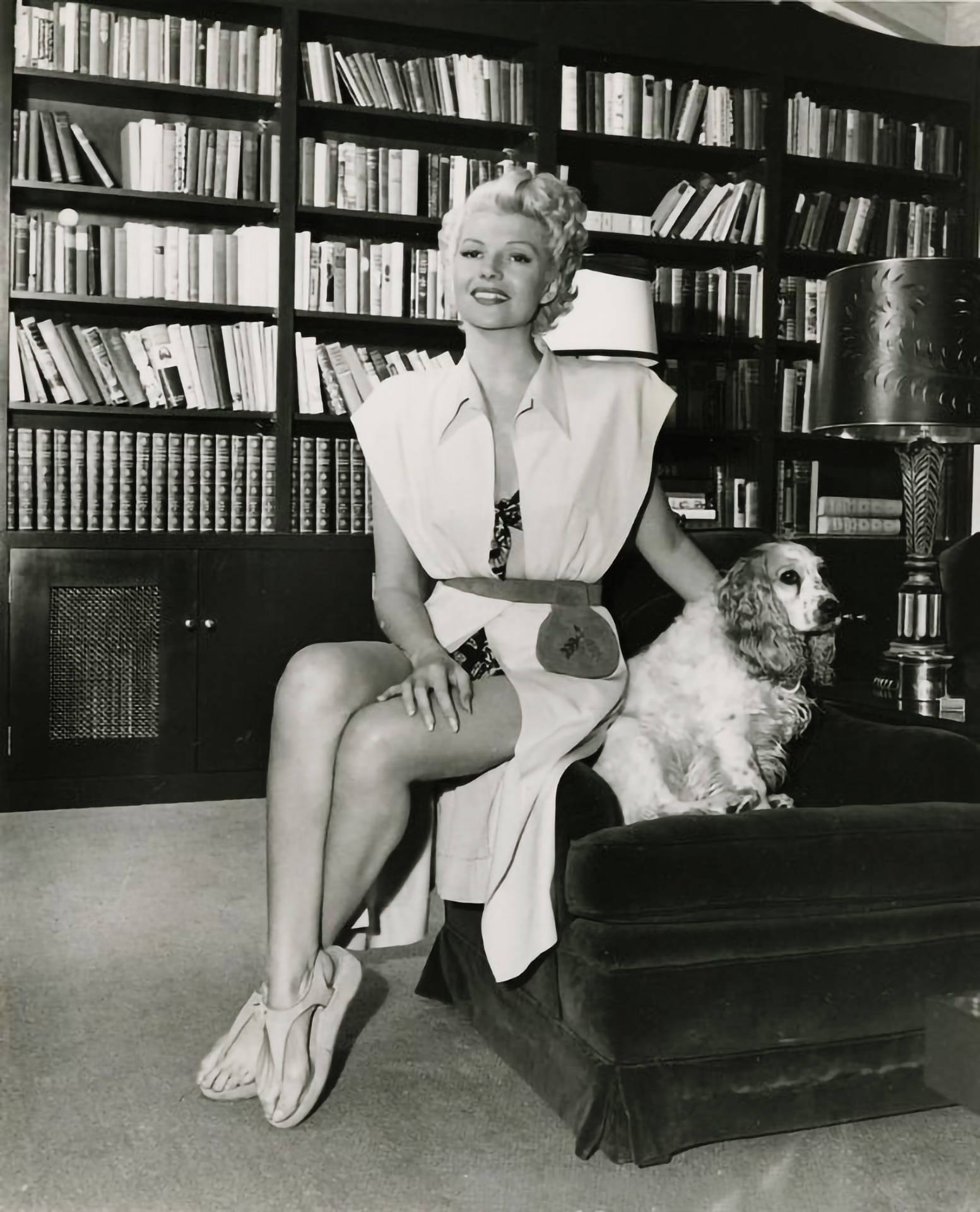 Rita Hayworth Beside A Dog Background