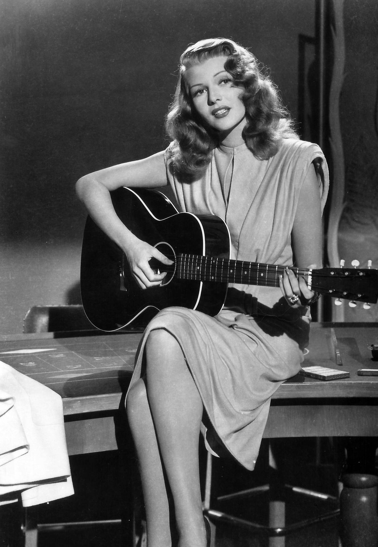 Rita Hayworth Playing Guitar Background