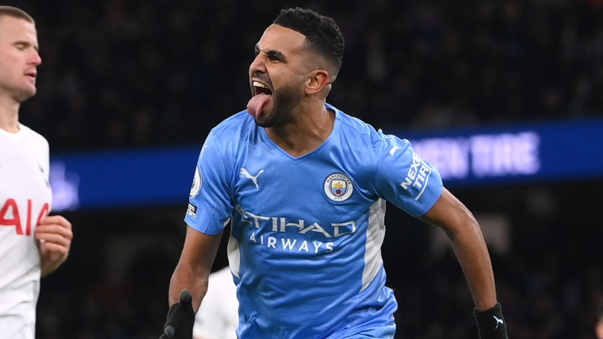 Riyad Mahrez Celebrating Tongue Out Background