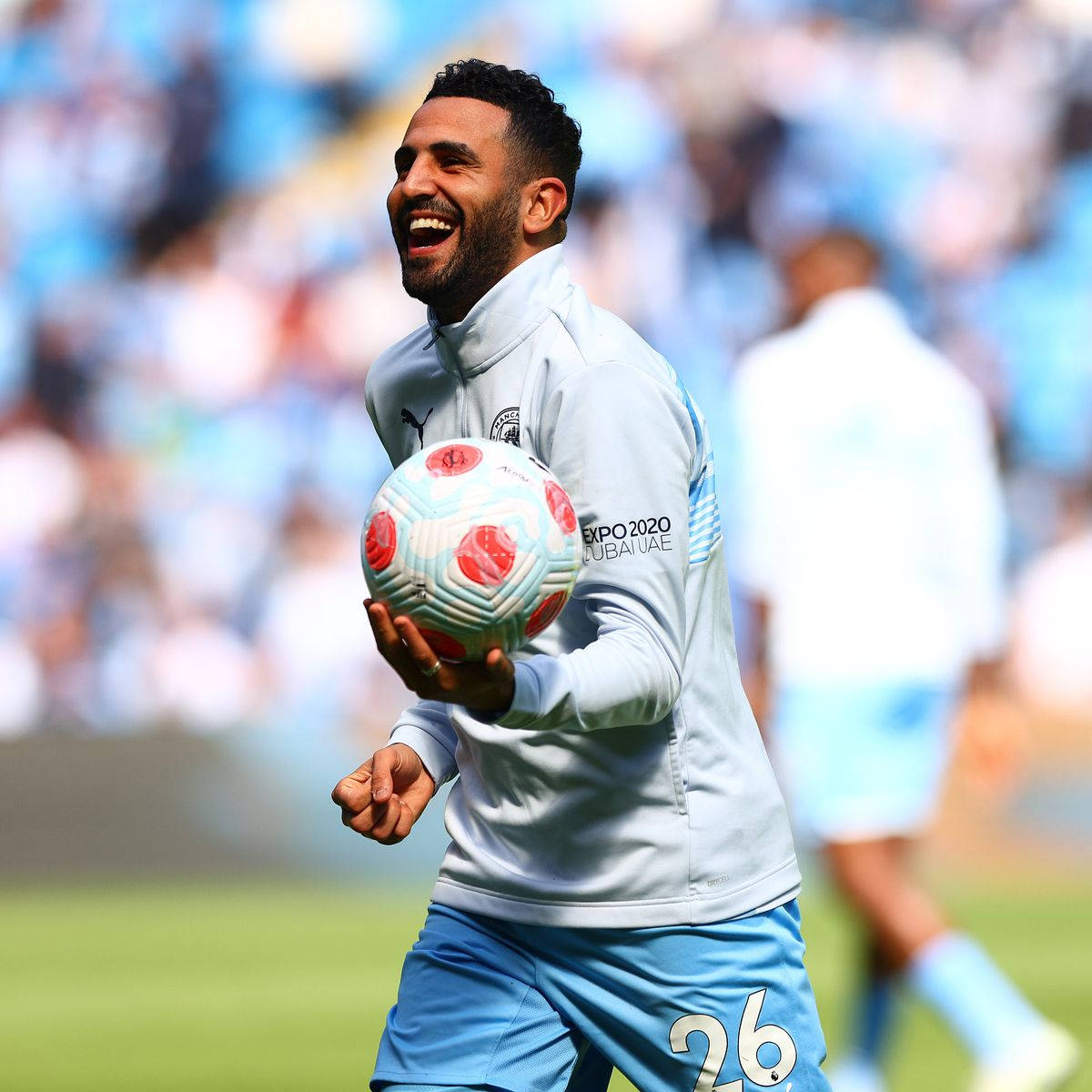 Riyad Mahrez Happy Running With Ball Background