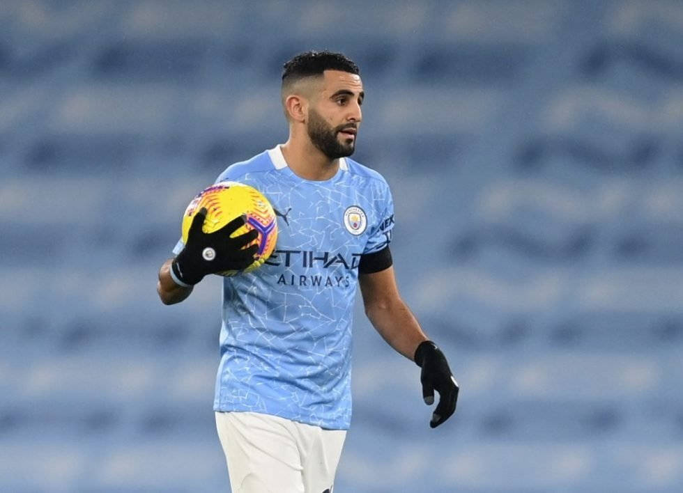 Riyad Mahrez Holding Yellow Ball Background