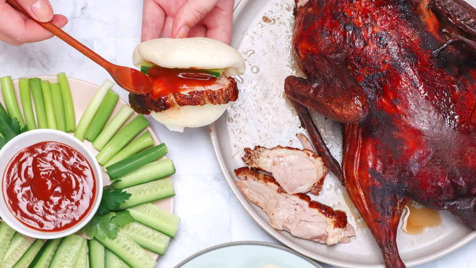 Roasted Peking Duck On A Bao Bun Background