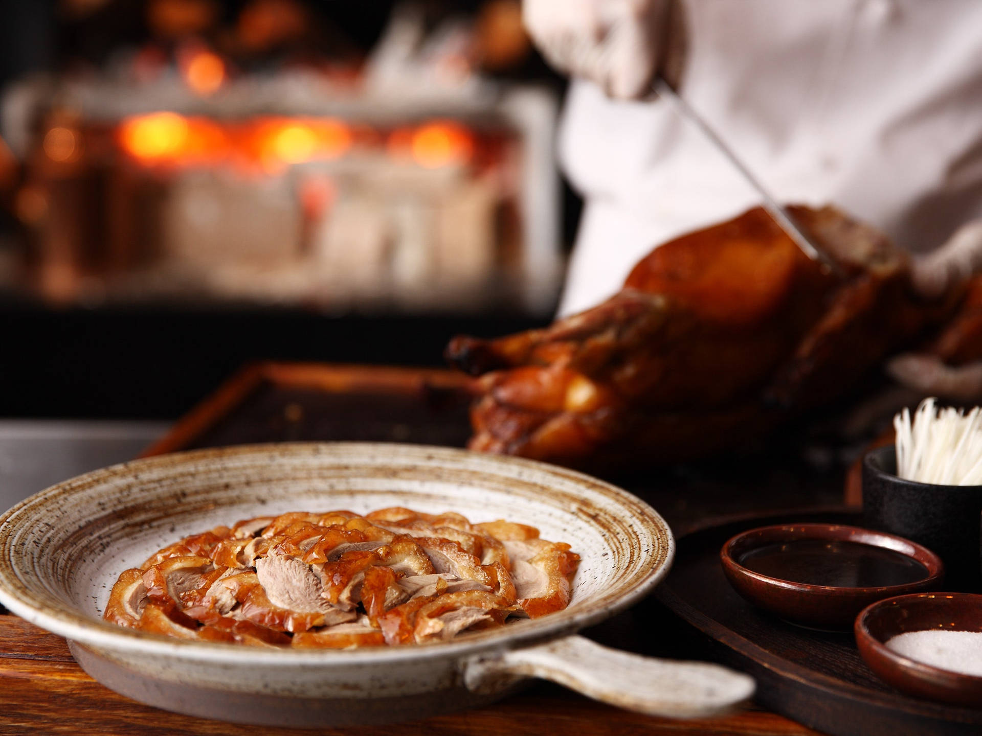 Roasted Peking Duck Slices On Decorated Pan Background