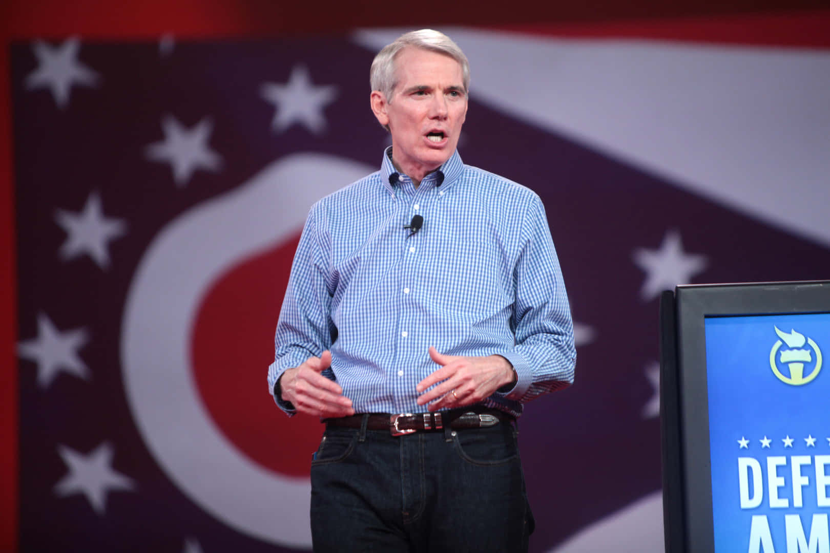 Rob Portman Delivering A Lecture Background
