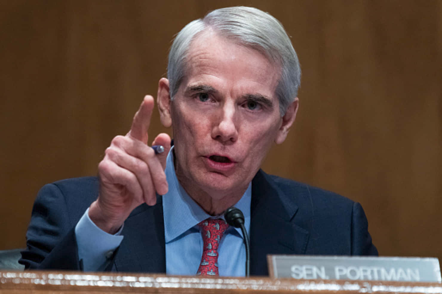 Rob Portman Expressively Gesturing During A Discussion Background