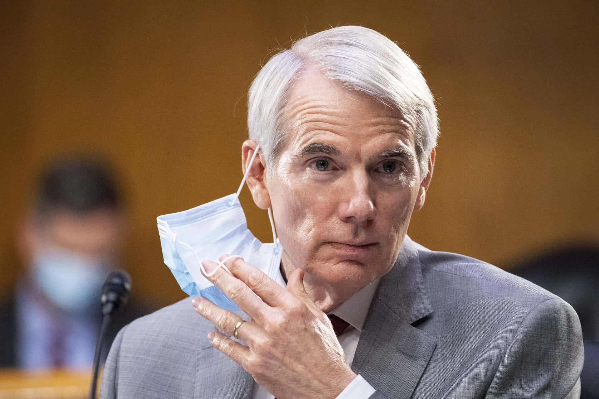 Rob Portman Removing Mask