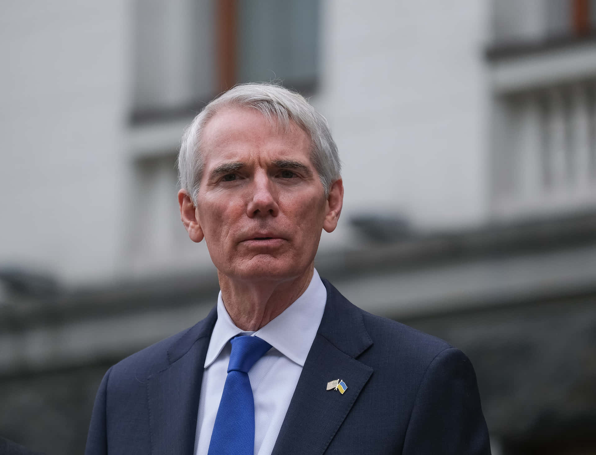 Rob Portman Serious Face Background