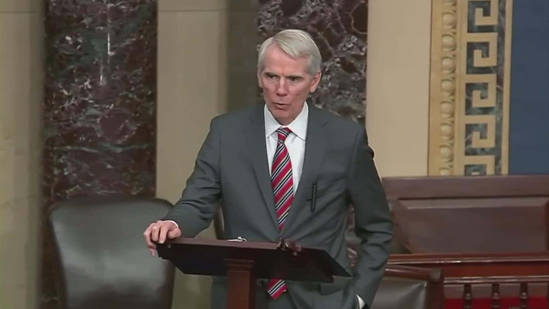 Rob Portman Talking Hand On Podium Background