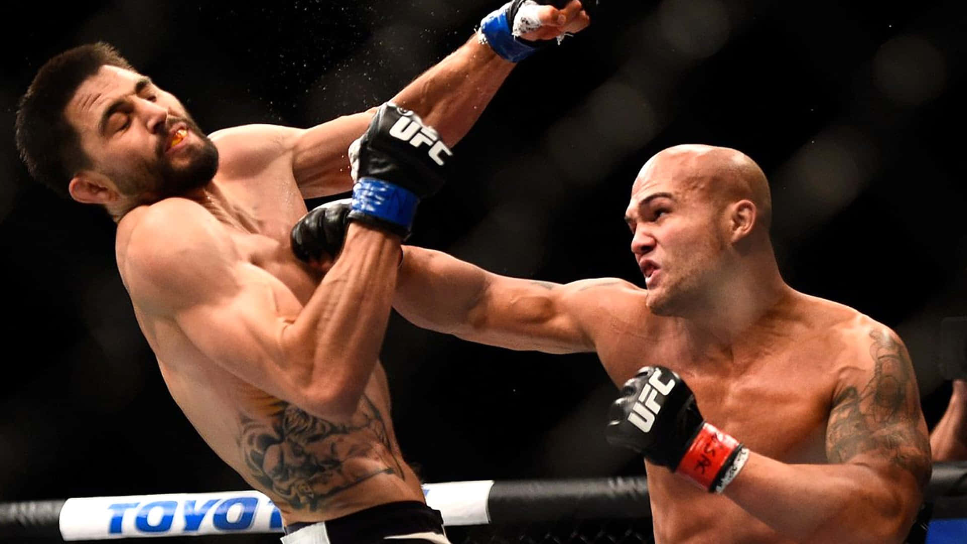 Robbie Lawler Punches Carlos Condit Background