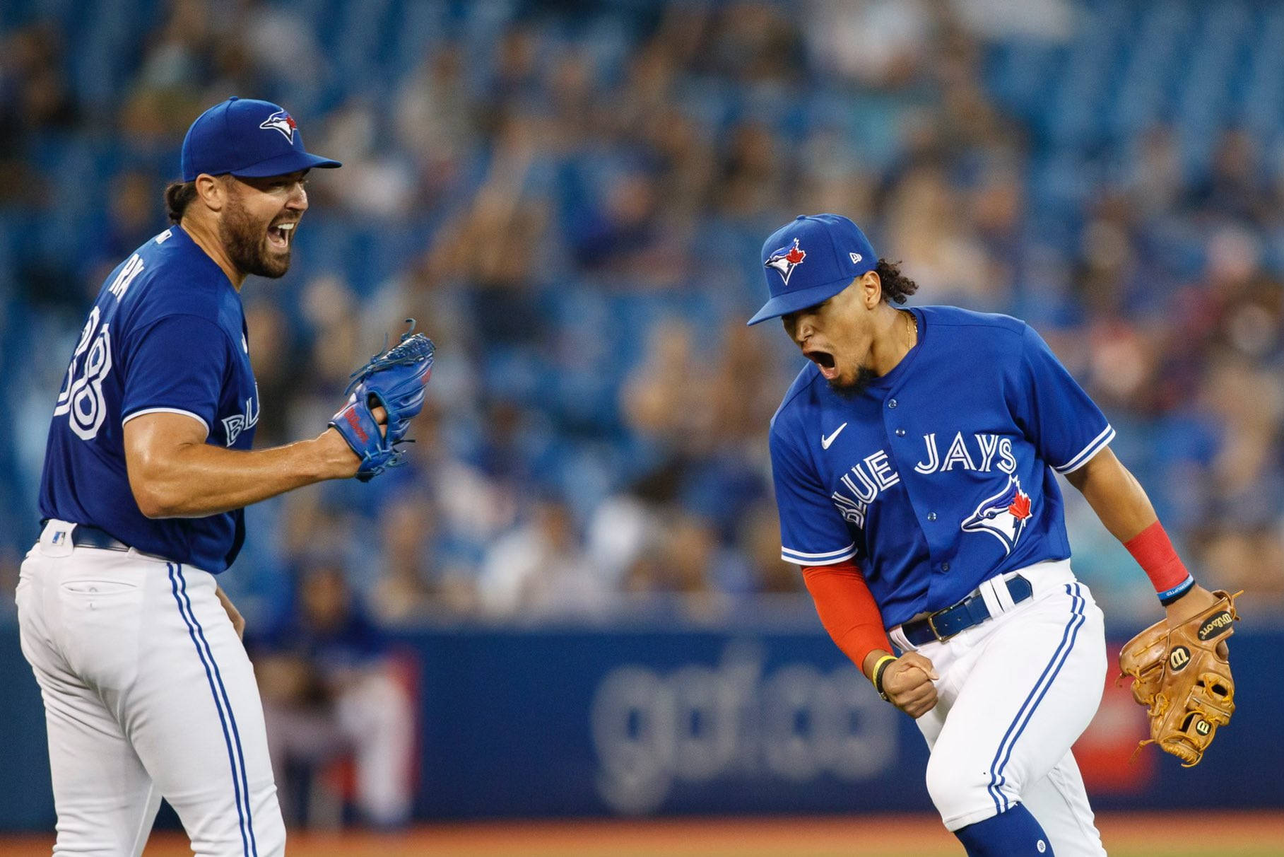 Robbie Ray Celebrating With Teammate Background