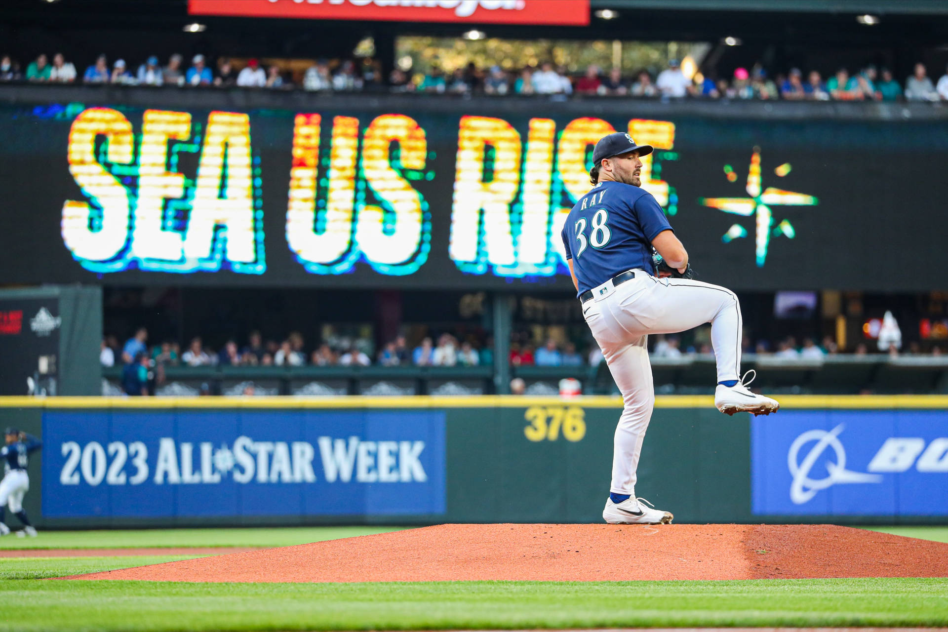 Robbie Ray In Pitching Position During A Match Background