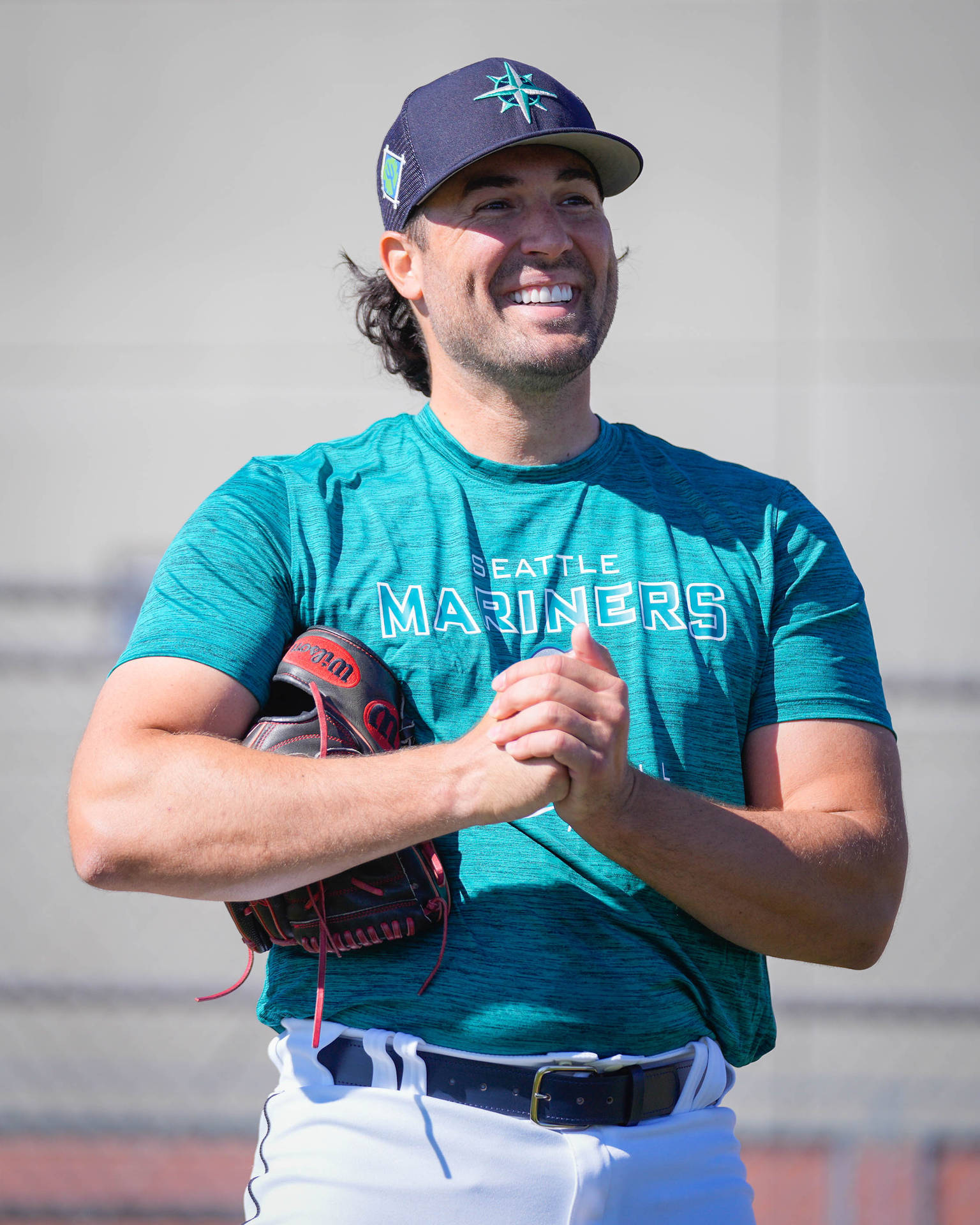 Robbie Ray Smiling With Hands Together Background