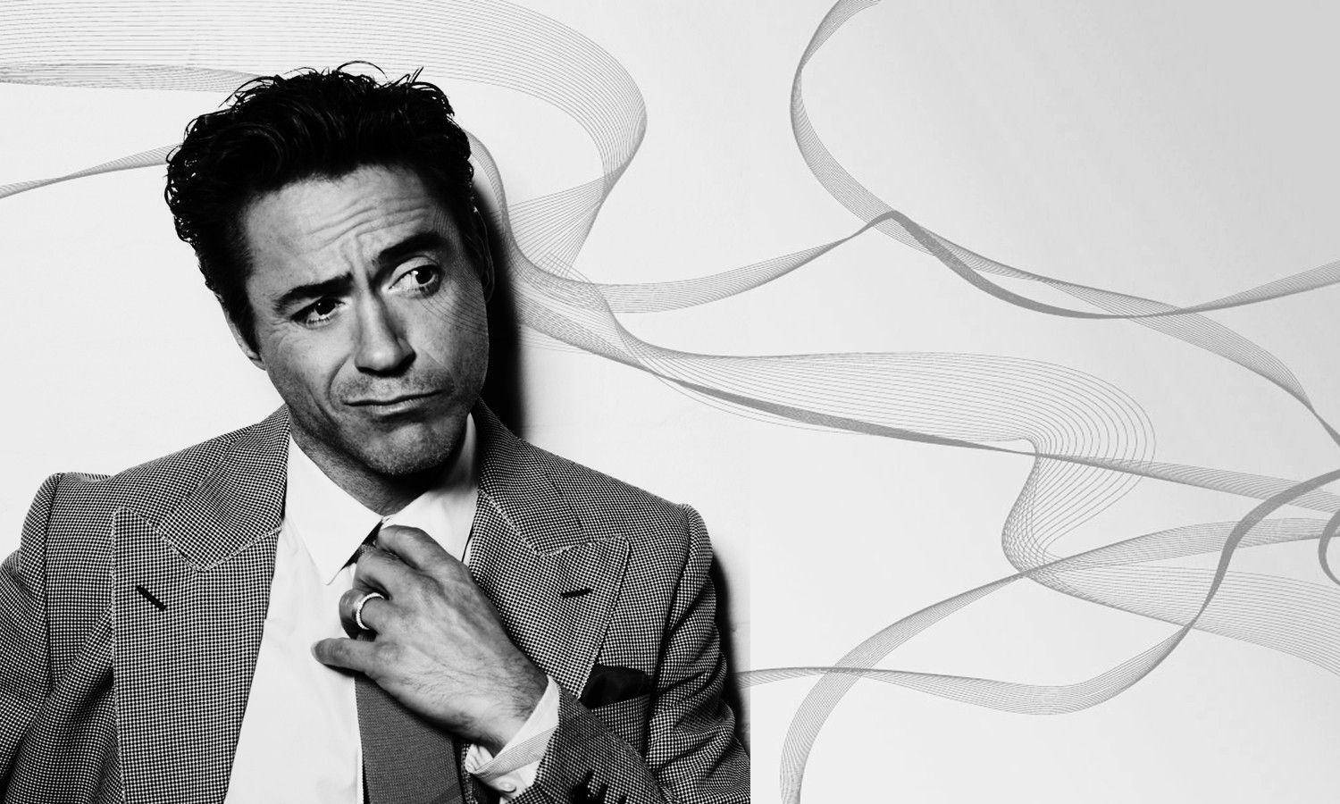 Robert Downey Jr Looking Dapper In A Suit And Tie Background