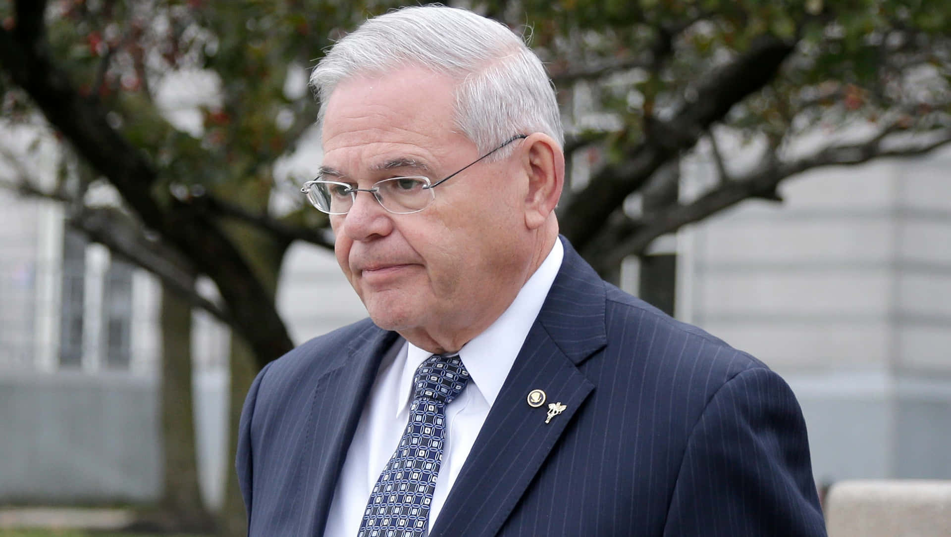 Robert Menendez Leaving The Federal Courthouse Background