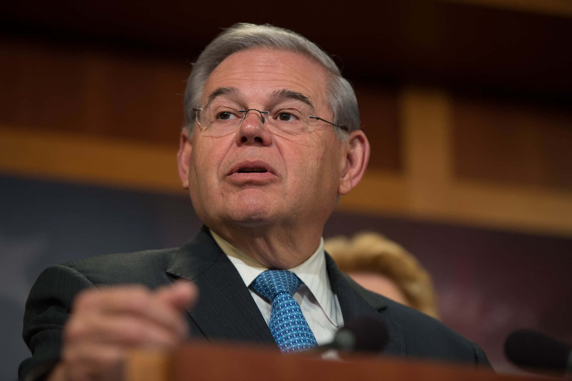 Robert Menendez On A Podium