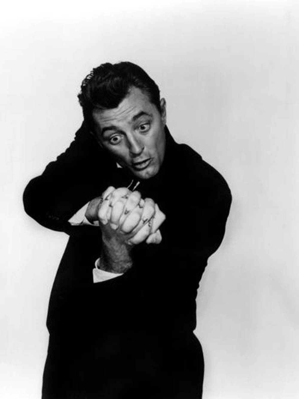 Robert Mitchum Black And White Fist Background