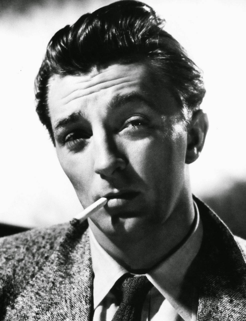 Robert Mitchum Smoking Black And White Background