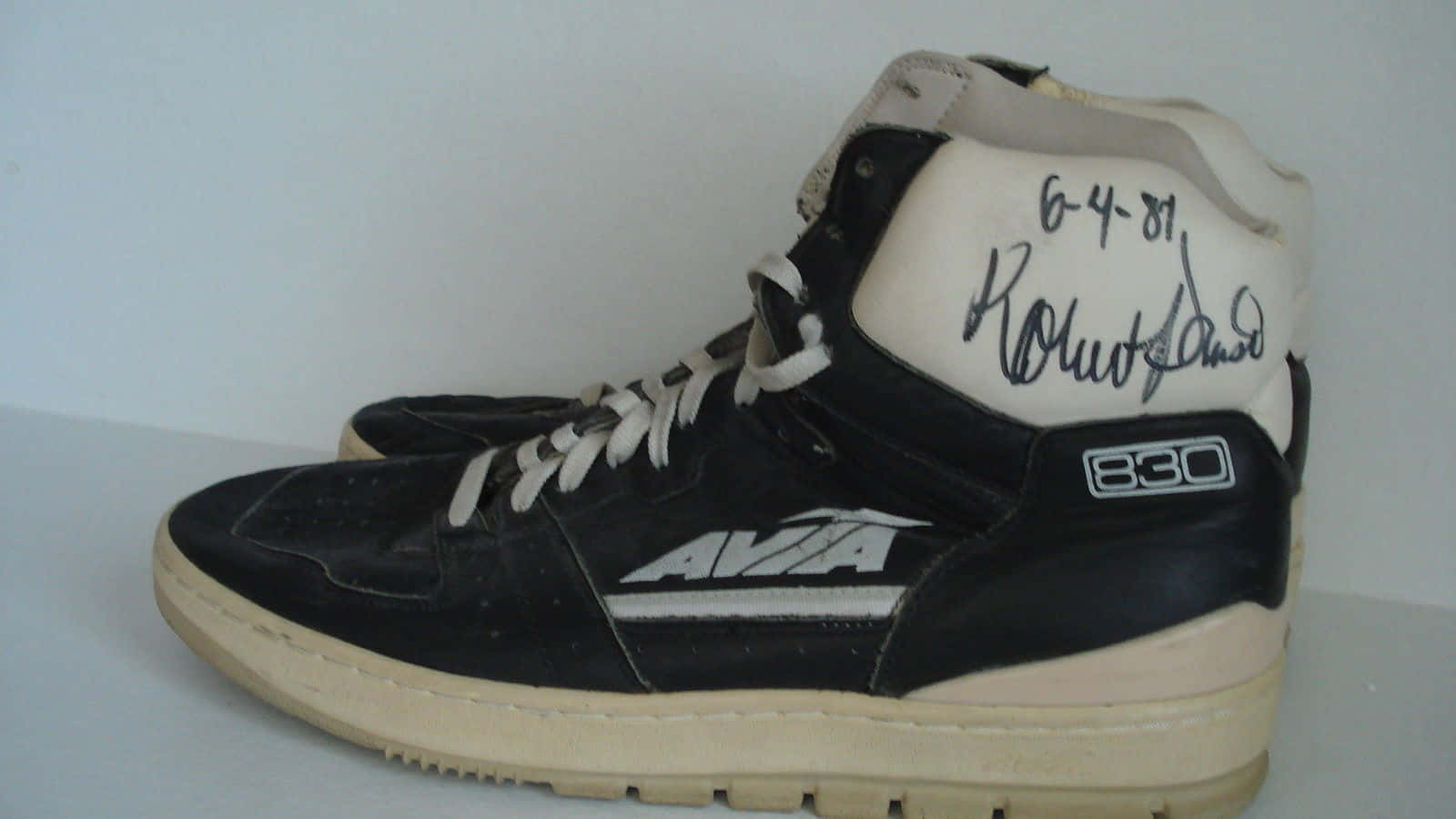 Robert Parish Autographed Basketball Shoes Background