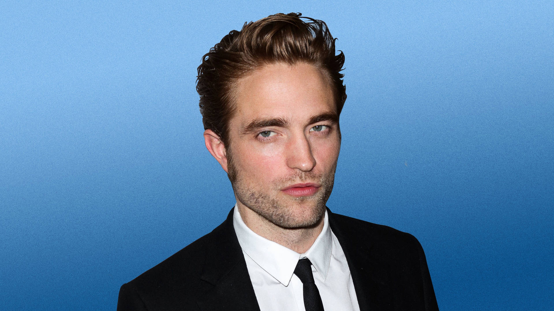 Robert Pattinson In Suit Background