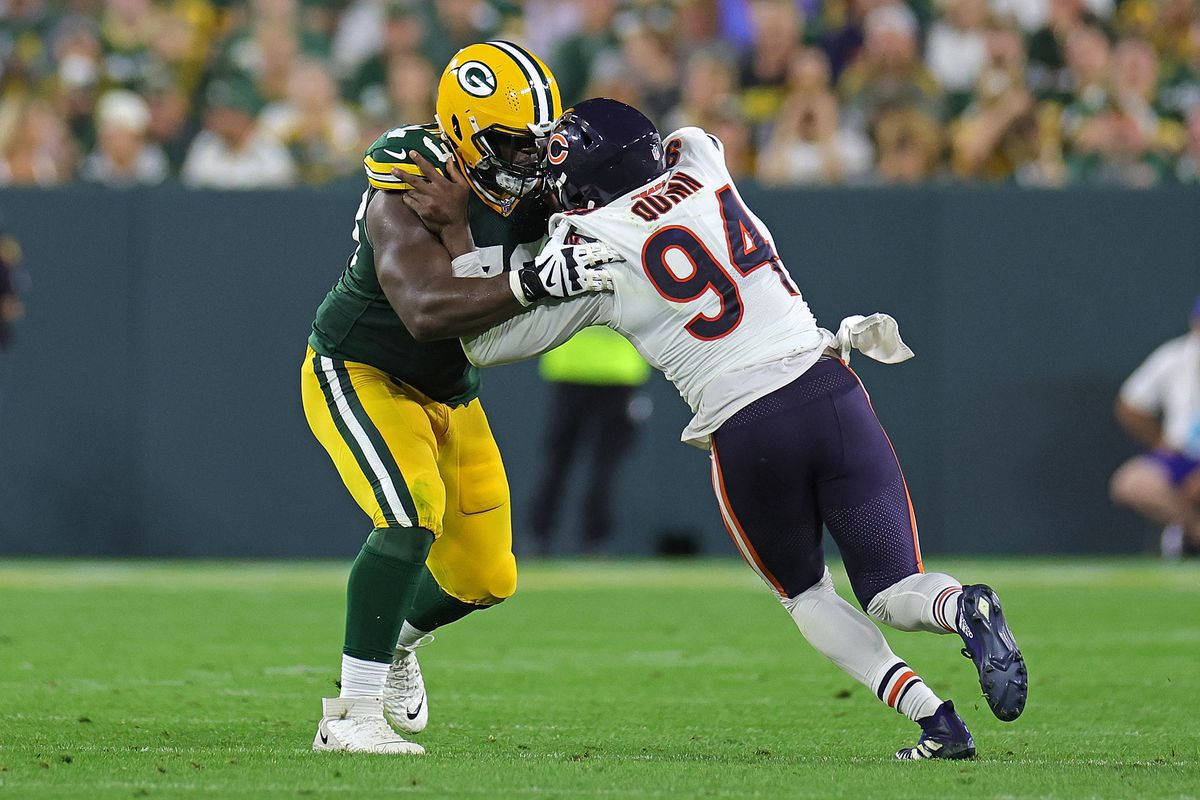 Robert Quinn Packers Tackle Background