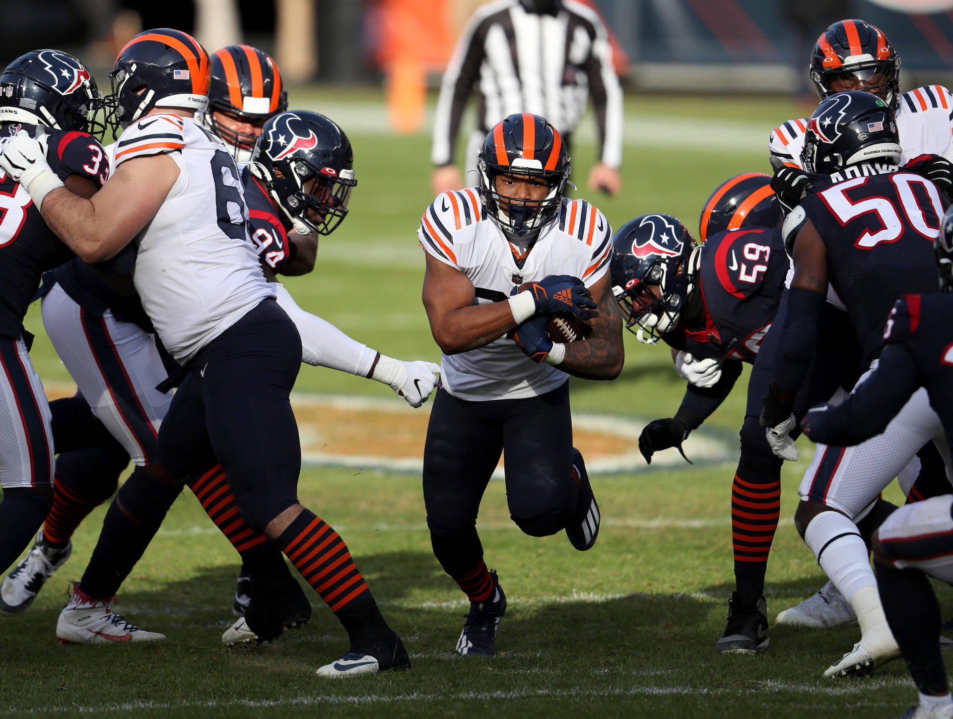 Robert Quinn Running With Ball Background