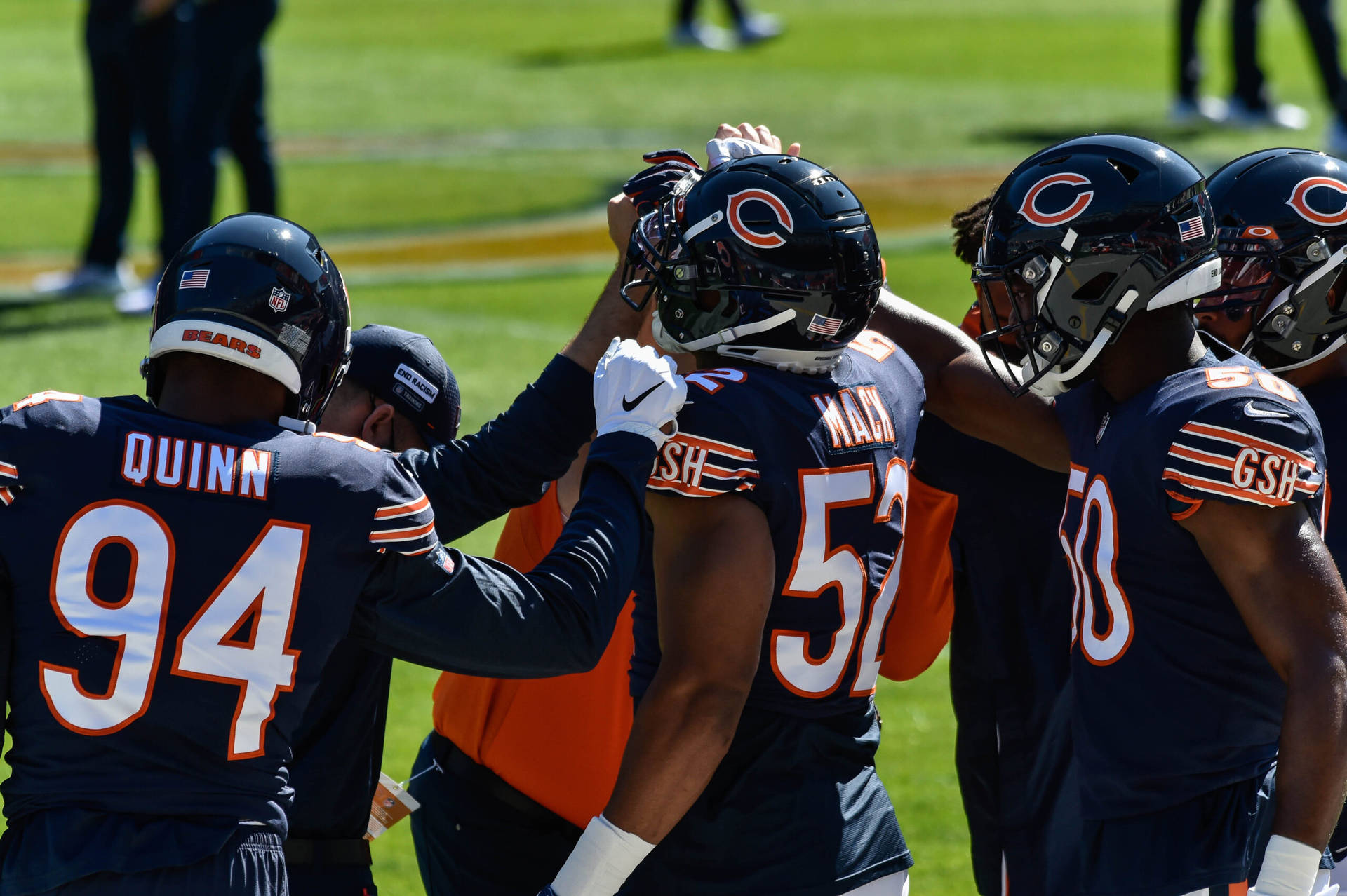 Robert Quinn Team Huddle Background