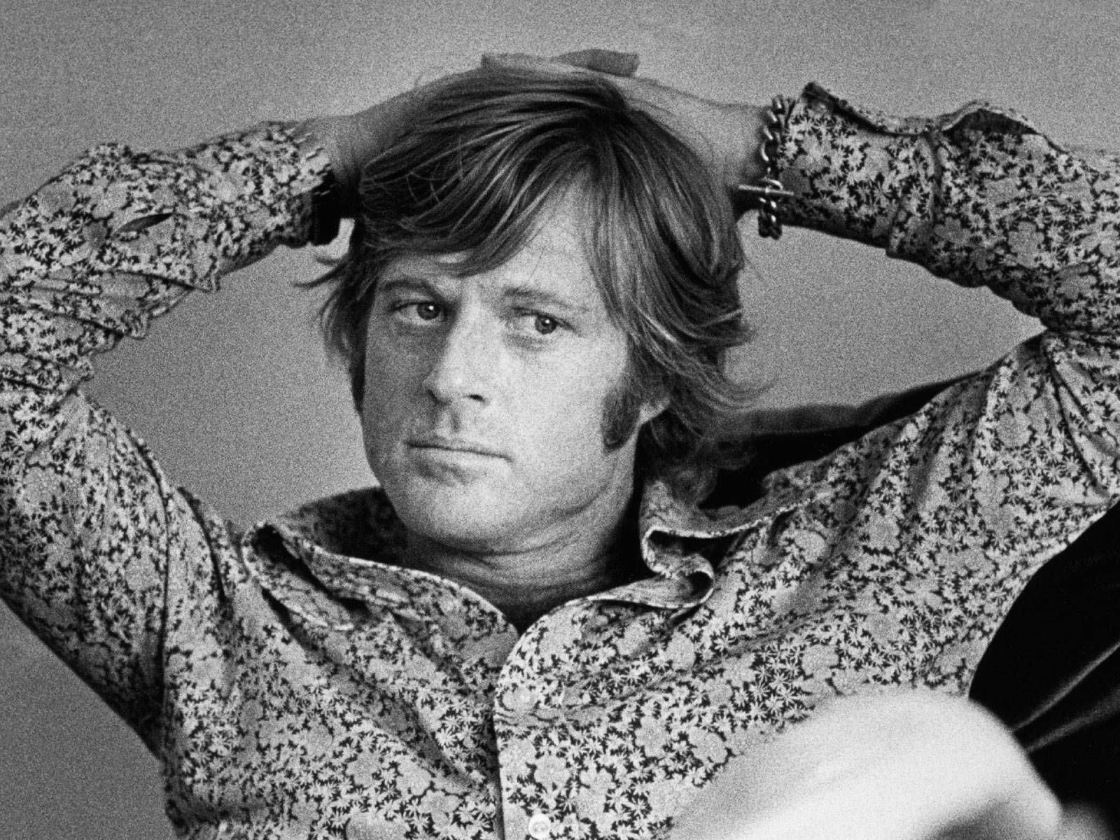Robert Redford Hands On His Head Background