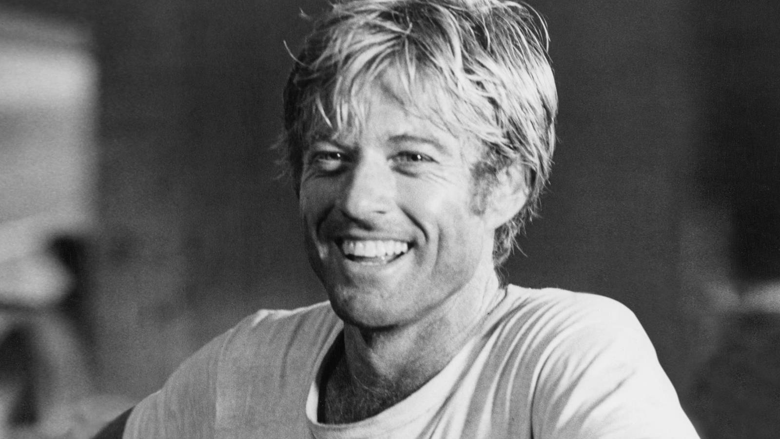 Robert Redford Young And Smiling Background