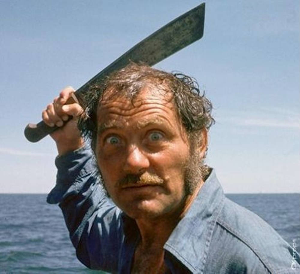 Robert Shaw Holding Ax