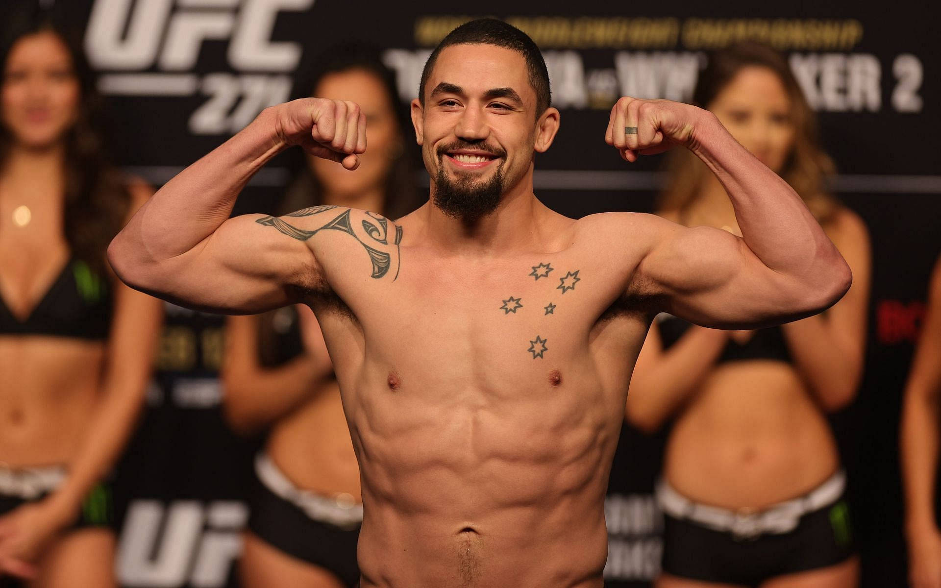 Robert Whittaker Doing Muscle Pose