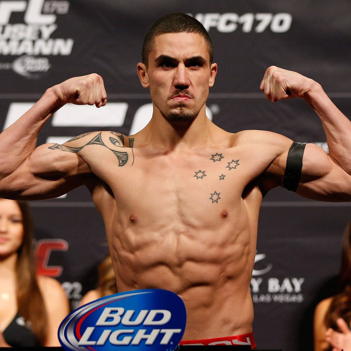 Robert Whittaker Showing Off Biceps