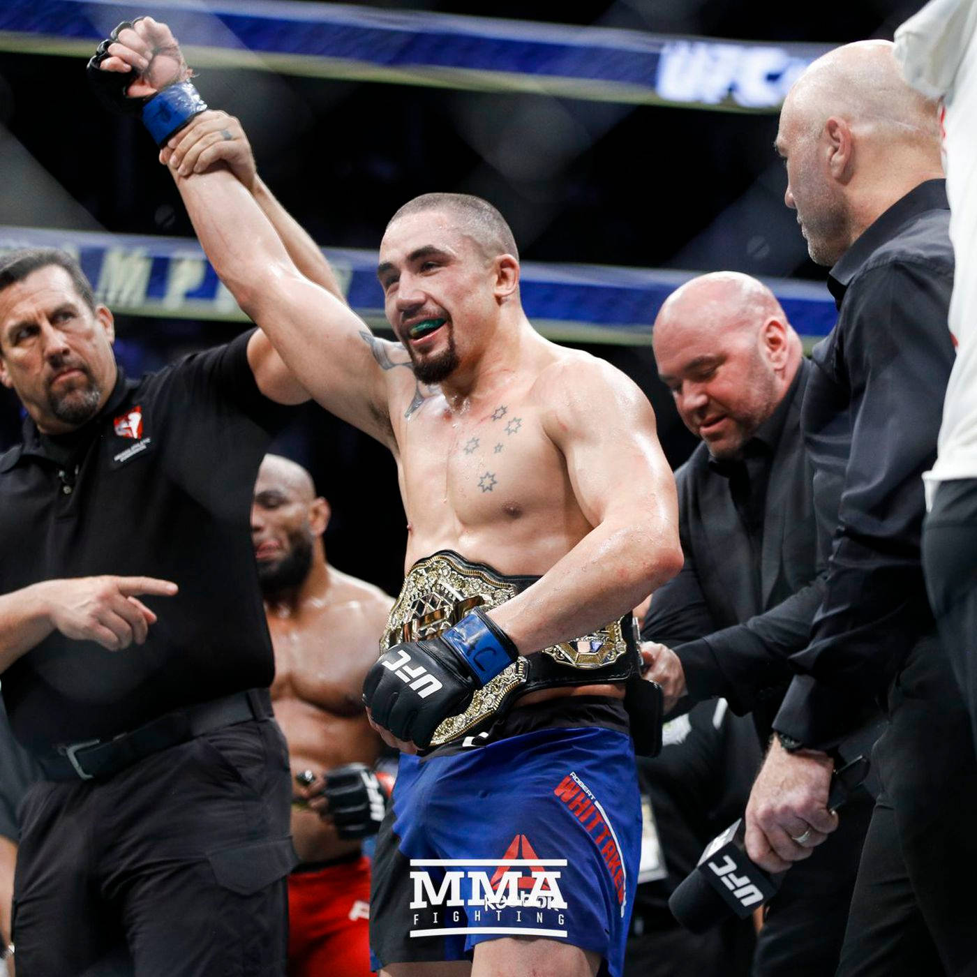 Robert Whittaker Wins Ufc Middleweight Title Background