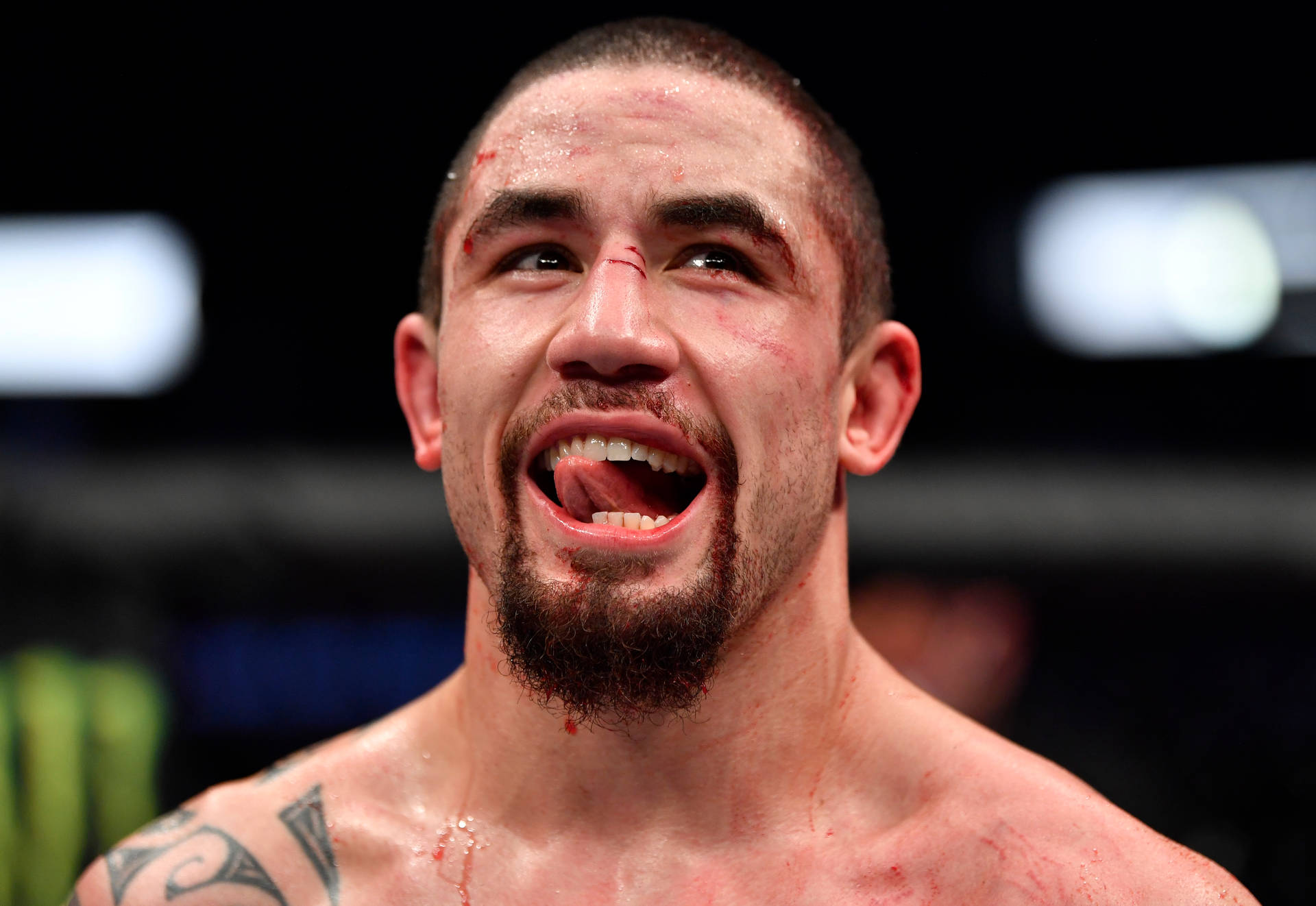 Robert Whittaker With Tongue Out Background