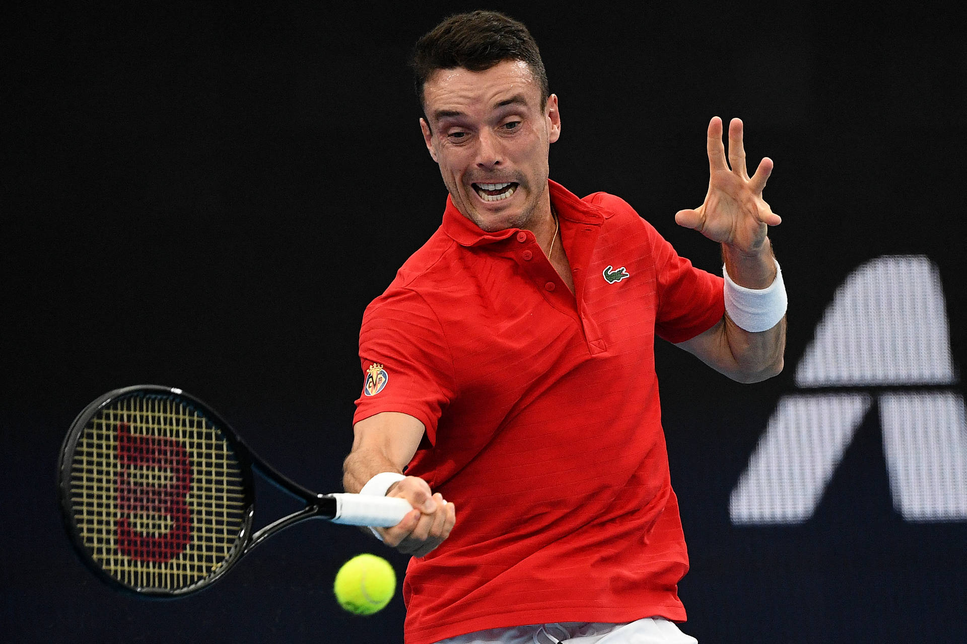 Roberto Bautista Agut Reaching For Ball Background