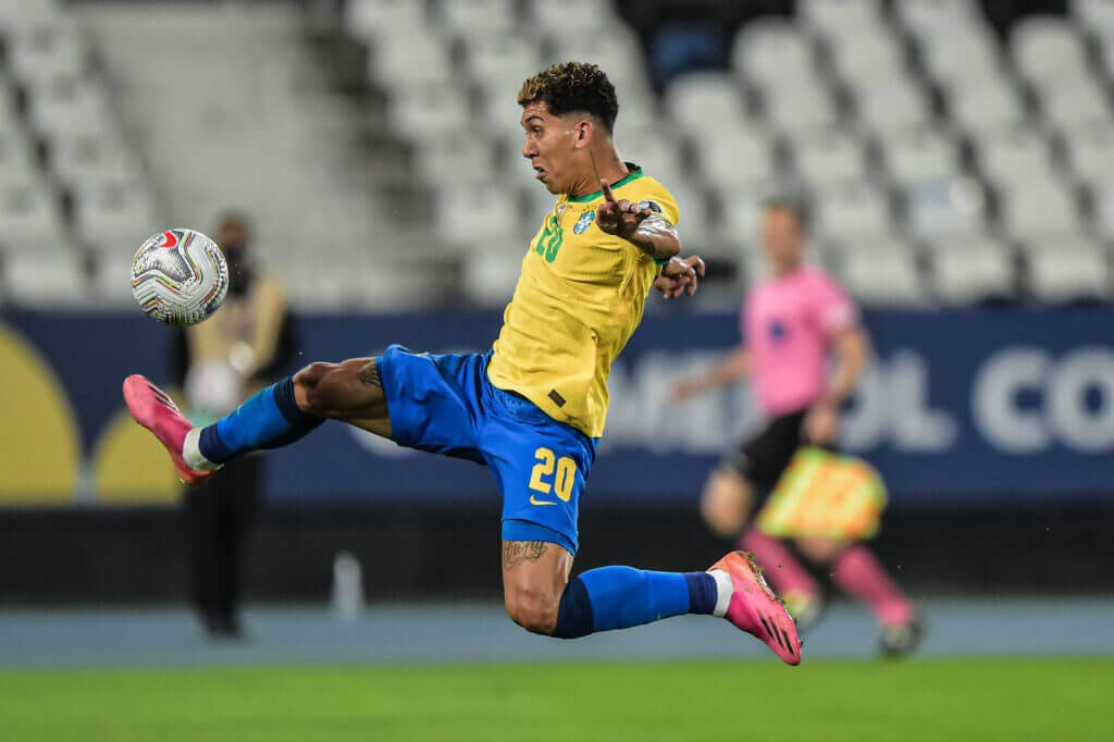 Roberto Firmino Kicks Ball Brazil Background