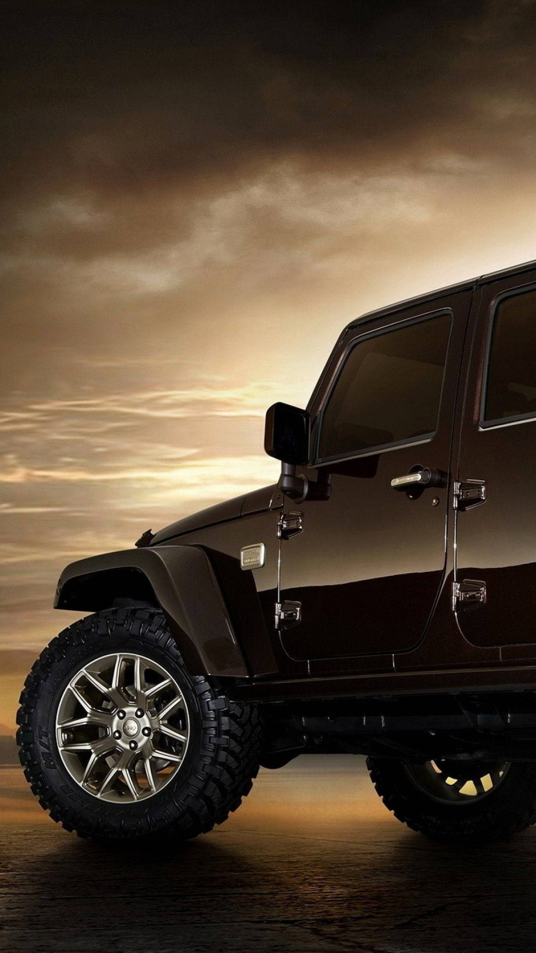 Robust Black Jeep Wrangler Unleashing Power On Unpredictable Terrains Background